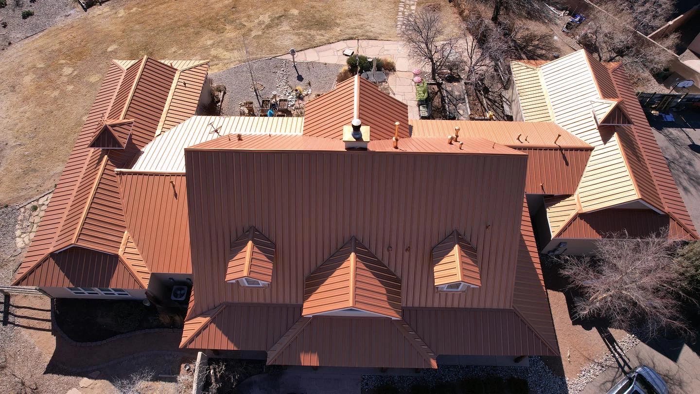 Copper standing-seam metal roof on a New Mexico home