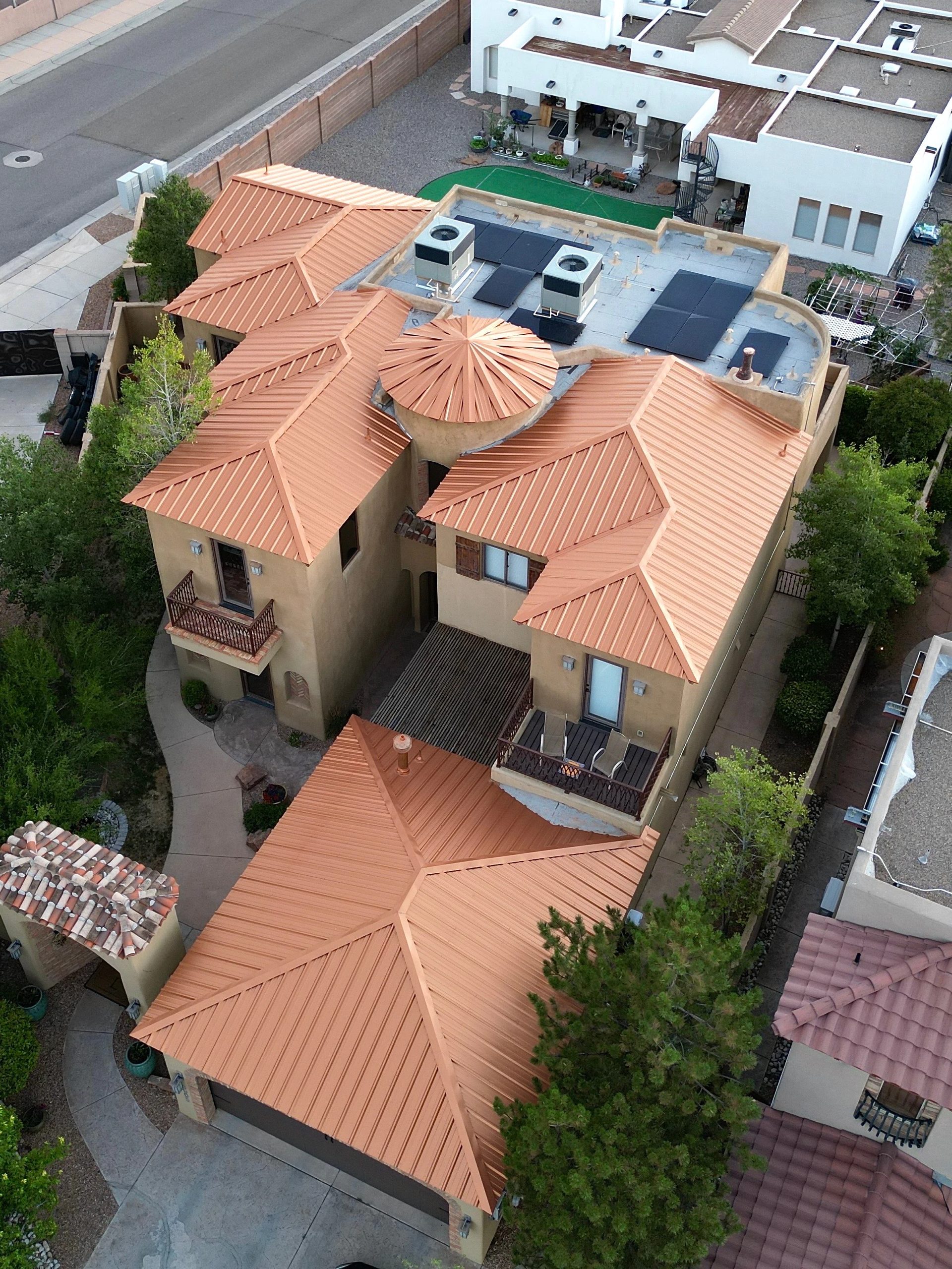 Aerial view of a newly finished standing-seam metal roof